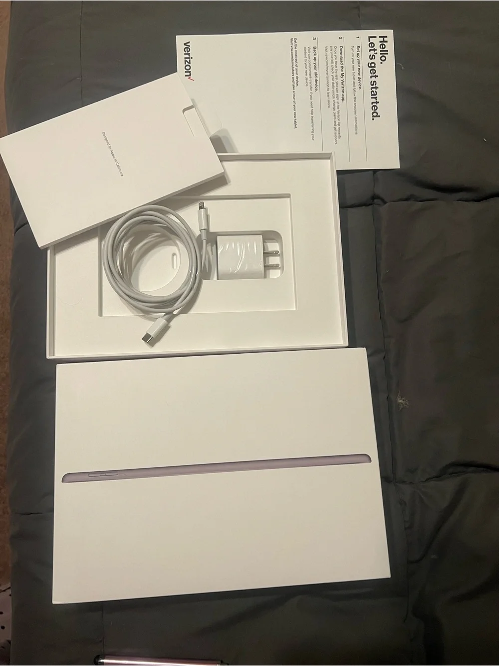 Apple iPad with Black Bezel and Blue Gradient Display